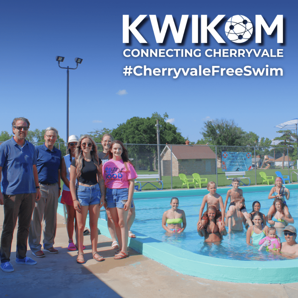 KWIKOM Employees Celebrating at Cherryvale Community Pool with Ahlayna McPherson, coordinator of Cherryvale Free Swim initiative and other community members